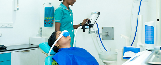 Patient receiving comfortable dental sedation treatment